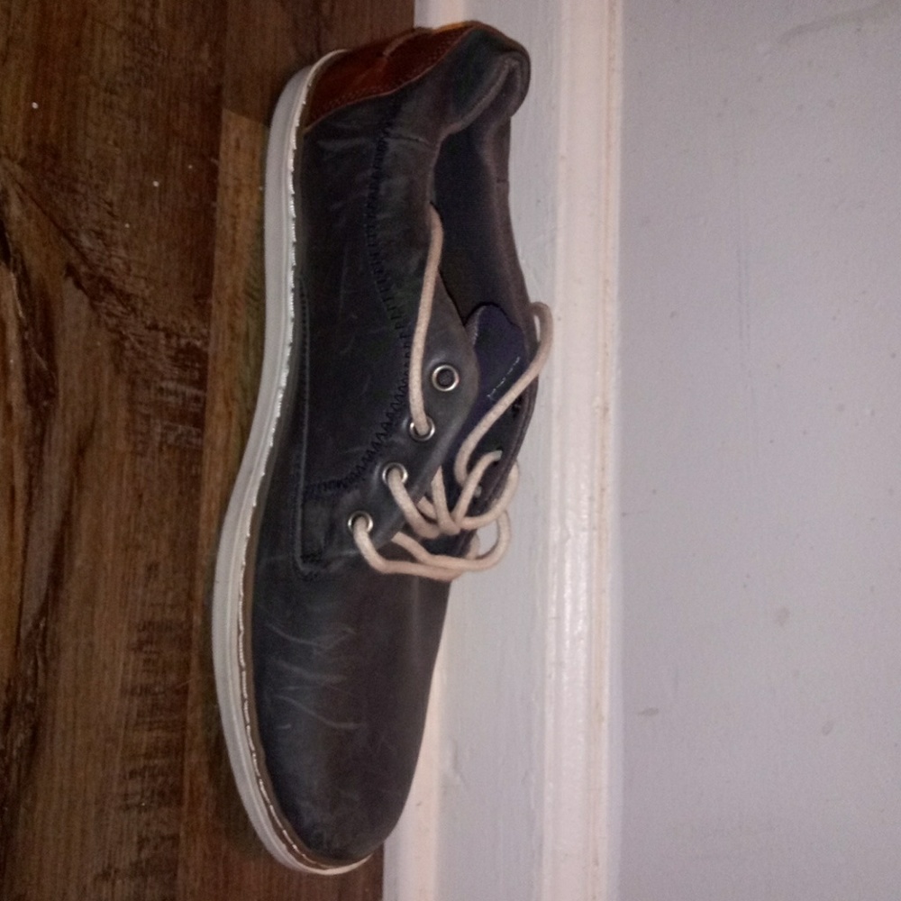 A gray leather men shoe